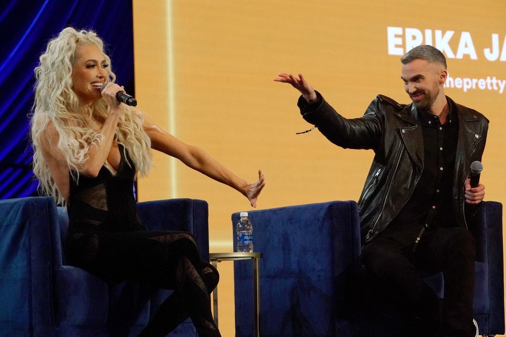 Erika Jayne and Mikey Minden on stage at BravoCon 2023