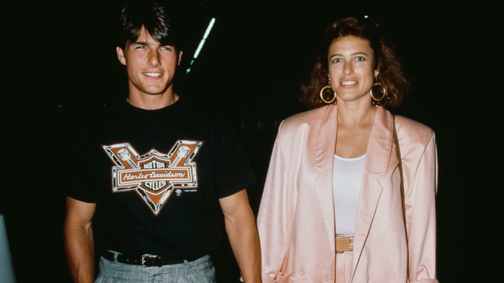 Tom Cruise and Mimi Rogers holding hands, United States, circa 1980s.