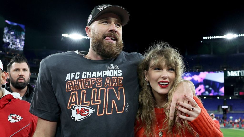 Travis Kelce #87 of the Kansas City Chiefs celebrates with Taylor Swift after a 17-10 victory against the Baltimore Ravens in the AFC Championship Game at M&T Bank Stadium on January 28, 2024 in Baltimore, Maryland.