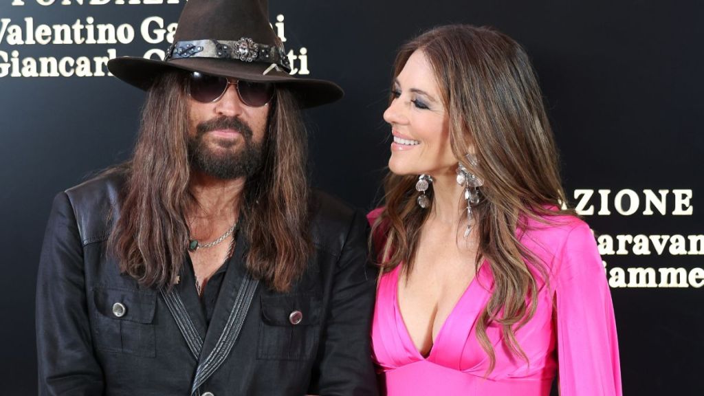Billy Ray Cyrus and Elizabeth Hurley attend the "Orizzonti | Rosso" Exhibition Opening Dinner at Palazzo Barberini on May 24, 2025 in Rome, Italy.