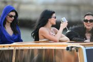 Kendall Jenner (L), US television personality Kris Jenner (R) and US Kylie Jenner leave the Gritti Palace Hotel for a party on the third day of the wedding of US Amazon founder Jeff Bezos with Lauren Sanchez, in Venice on June 28, 2025