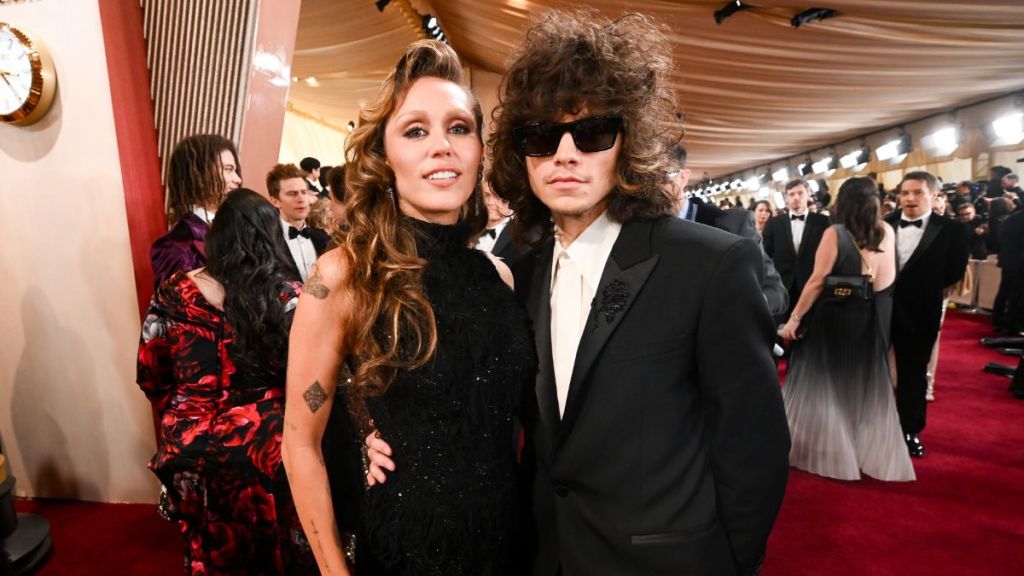 Miley Cyrus, Maxx Morando at the 97th Oscars held at the Dolby Theatre on March 02, 2025 in Hollywood, California