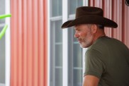 Side profile shot of Steve McBee in a green shirt and brown cowboy hat