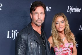 Aaron Phypers and Denise Richards posing on a red carpet