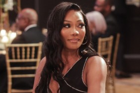 Angela Oakley sitting at a table and wearing a black dress during the RHOA Season 16 finale