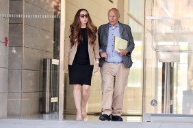 Tom Girardi and his lawyer leaving court