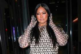 Garcelle Beauvais fixing her hair while leaving the Watch What Happens Live studios