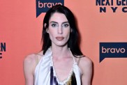 Georgia McCann in a white dress at the premiere of Next Gen NYC
