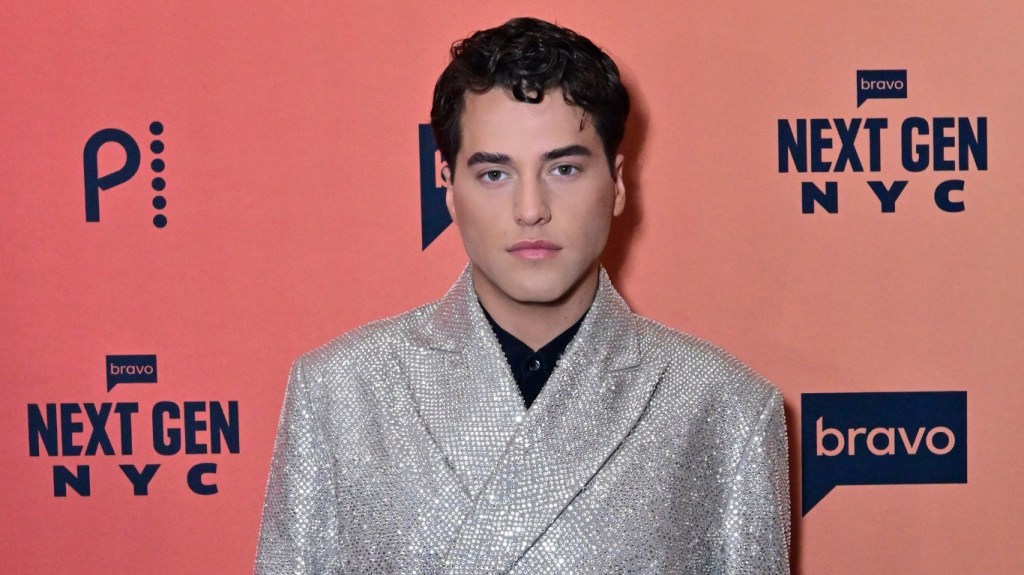 Brooks Marks in a silver jacket at the Season 1 premiere of Next Gen NYC