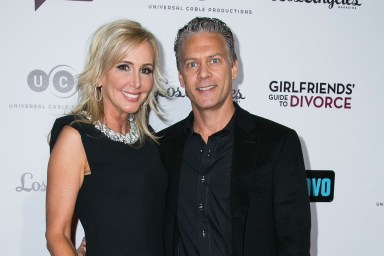Shannon Beador and David Beador wearing black and posing together in 2014