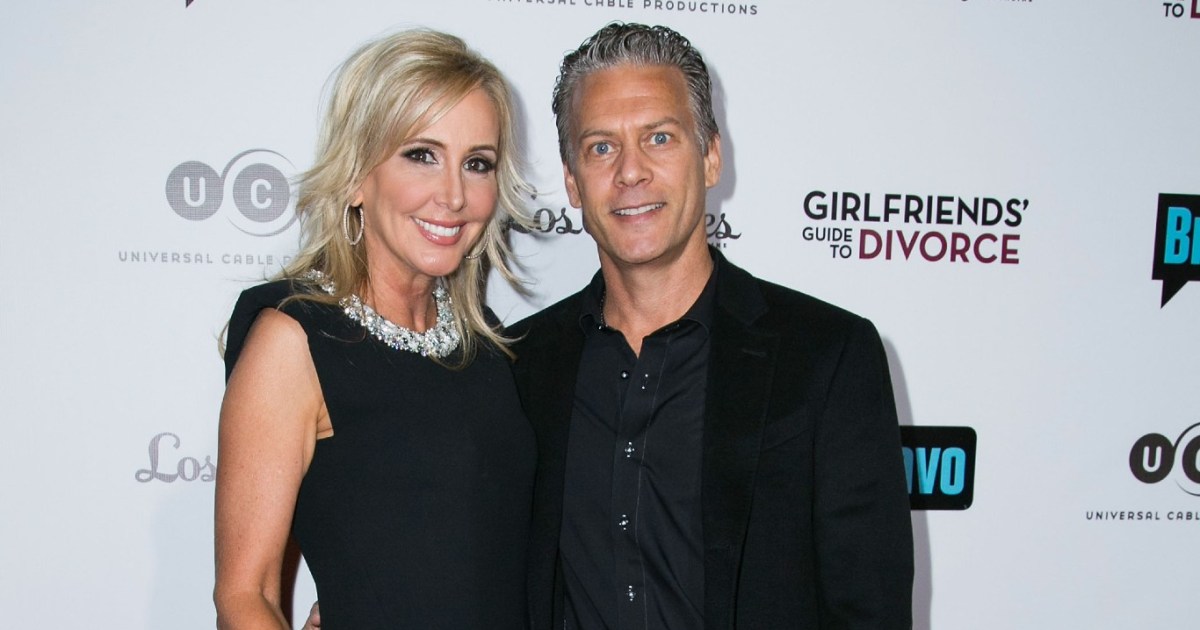 Shannon Beador and David Beador wearing black and posing together in 2014