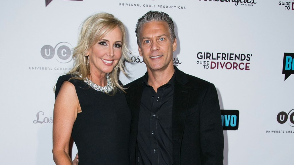 Shannon Beador and David Beador wearing black and posing together in 2014