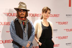Actors Johnny Depp (L) and Angelina Jolie attend 'The Tourist' photocall at the Villamagna Hotel on December 16, 2010 in Madrid, Spain