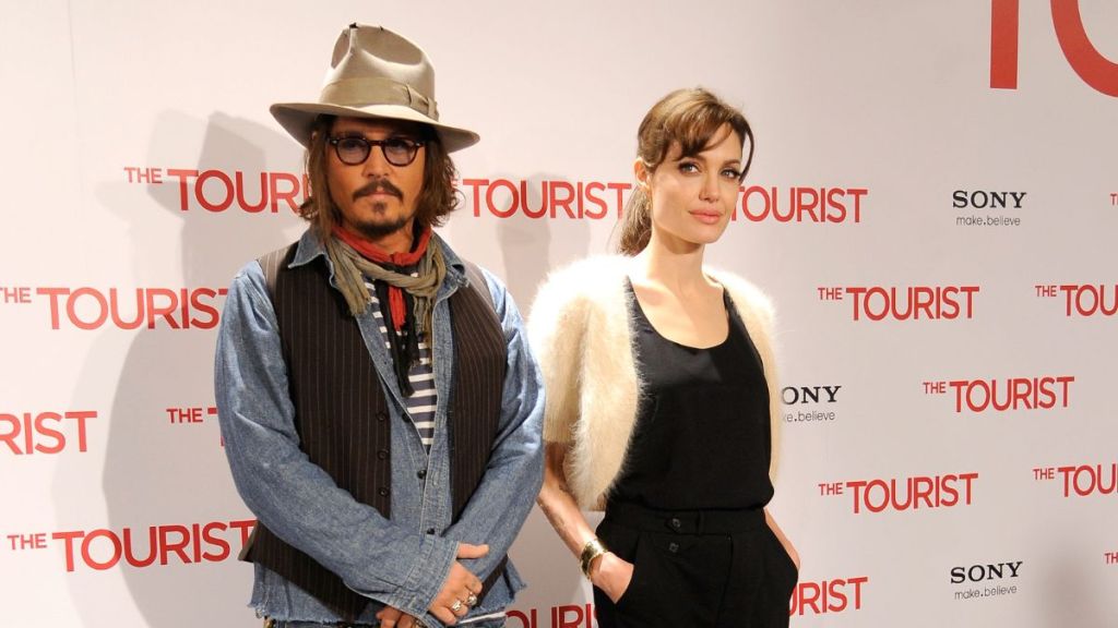 Actors Johnny Depp (L) and Angelina Jolie attend 'The Tourist' photocall at the Villamagna Hotel on December 16, 2010 in Madrid, Spain