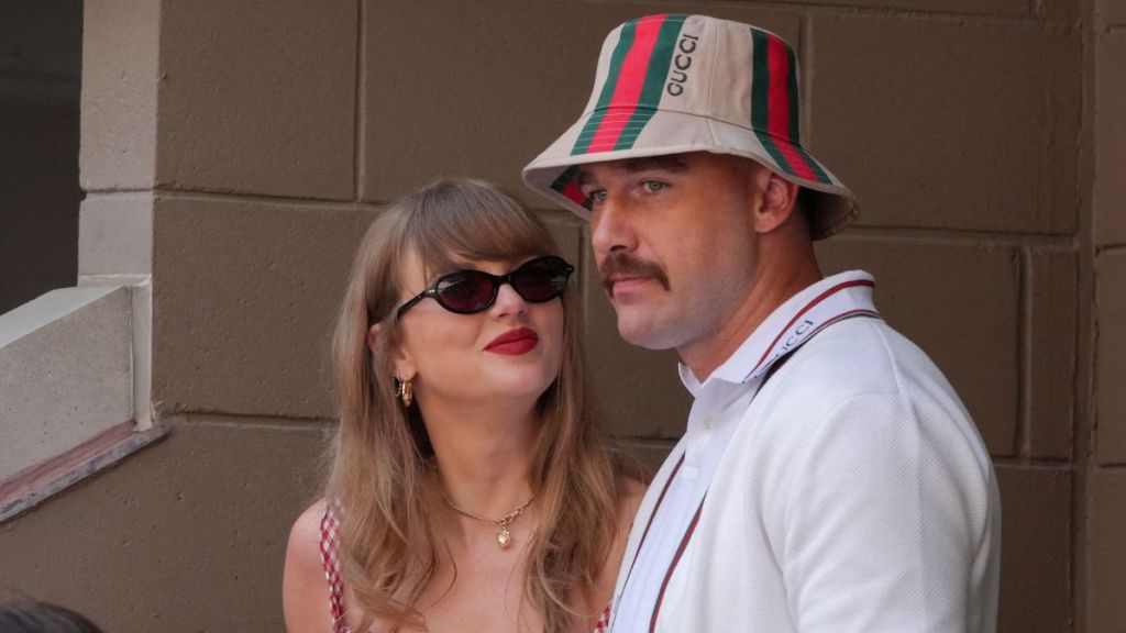 US musician Taylor Swift (L) and US NFL football player Travis Kelce (R) attend the men's final match between Italy's Jannik Sinner and USA's Taylor Fritz on day fourteen of the US Open tennis tournament at the USTA Billie Jean King National Tennis Center in New York City, on September 8, 2024.