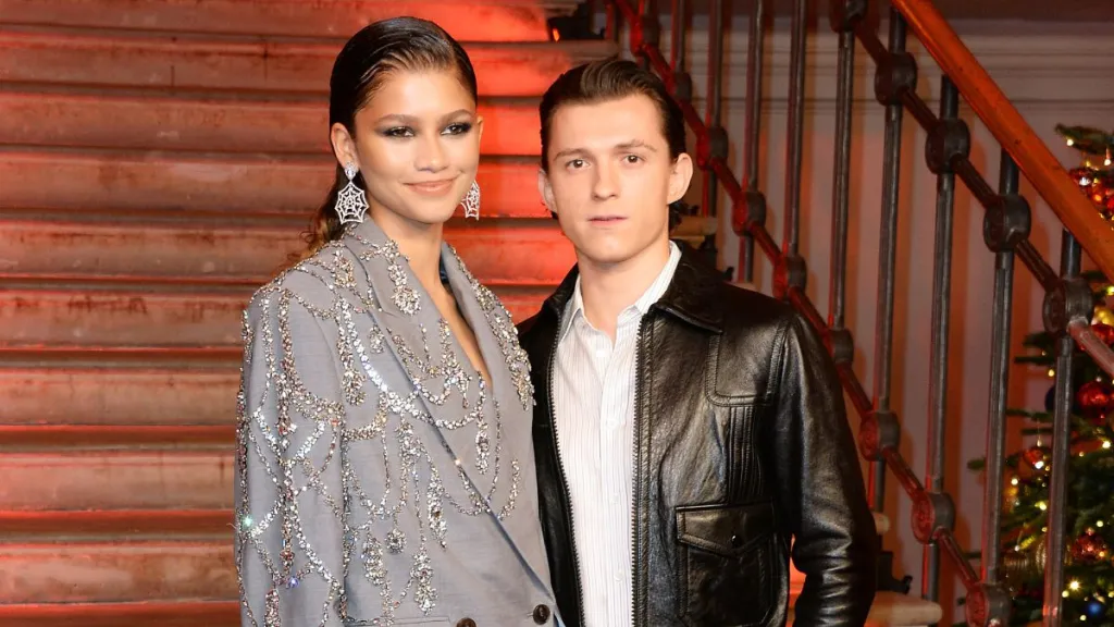 Zendaya and Tom Holland pose at a photocall for "Spider-Man: No Way Home" at The Old Sessions House on December 5, 2021 in London, England.