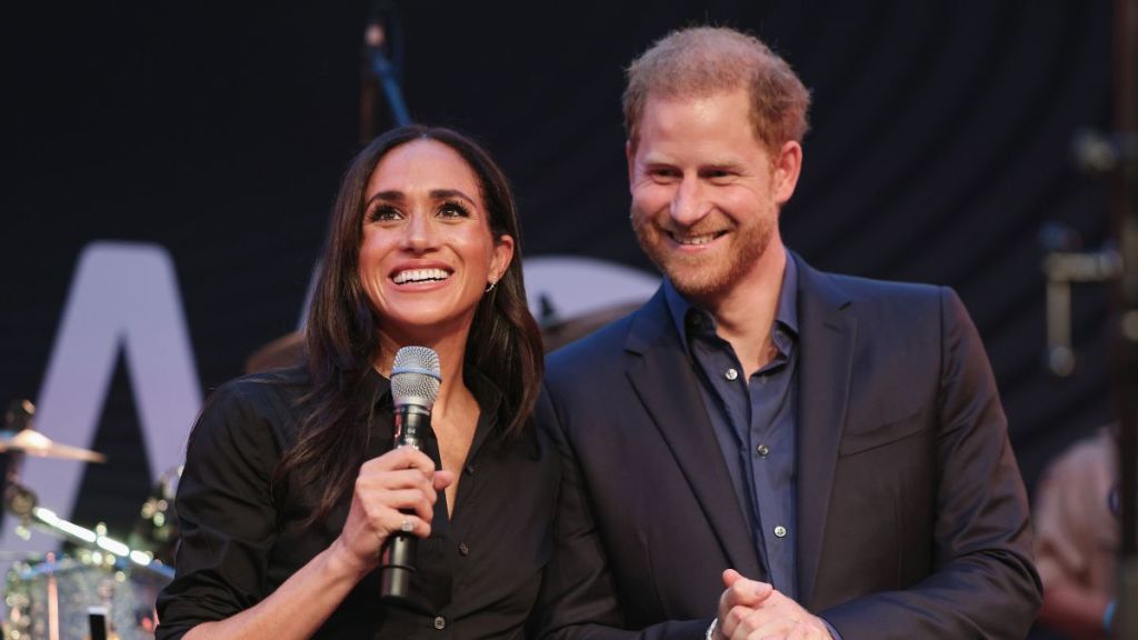 Prince Harry, Duke of Sussex and Meghan, Duchess of Sussex speak on stage at the "Friends @ Home Event" at the Station Airport during day three of the Invictus Games Düsseldorf 2023 on September 12, 2023 in Duesseldorf, Germany.