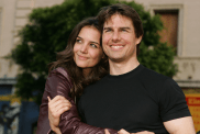 Actor Tom Cruise (R) and actress Katie Holmes arrive at the Los Angeles Fan Screening of "War of the Worlds" at the Grauman's Chinese Theatre on June 27, 2005 in Hollywood, California.