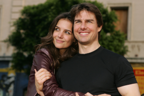 Actor Tom Cruise (R) and actress Katie Holmes arrive at the Los Angeles Fan Screening of "War of the Worlds" at the Grauman's Chinese Theatre on June 27, 2005 in Hollywood, California.