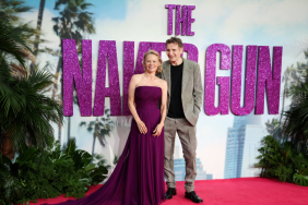 US actress Pamela Anderson (L) and British actor Liam Neeson (R) pose on the red carpet upon arrival for the UK Premier of "Naked Gun" in Leicester Square, central London, on July 22, 2025.