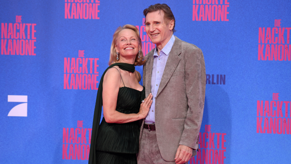 US actress Pamela Anderson and british-irish actor Liam Neeson attend the Berlin premiere of the movie "The Naked Gun" (German Title: Die Nackte Kanone) at UCI Luxe East Side Gallery on July 24, 2025 in Berlin, Germany.