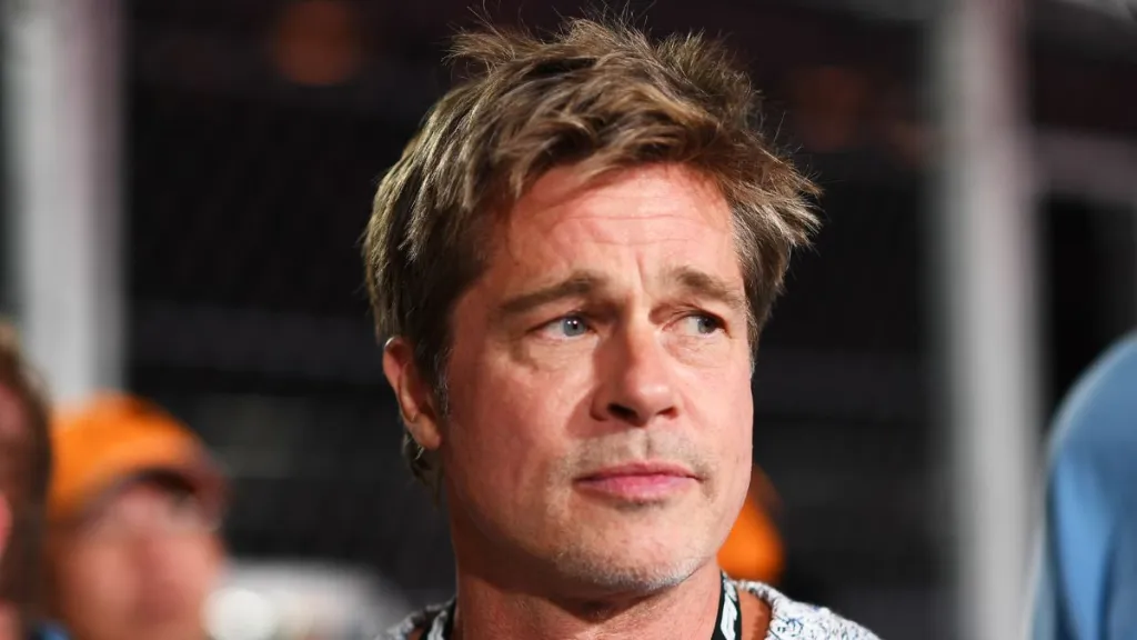 Brad Pitt, star of the upcoming Formula One based movie, Apex, walks in the Pitlane prior to qualifying ahead of the F1 Grand Prix of Las Vegas at Las Vegas Strip Circuit on November 17, 2023 in Las Vegas, Nevada