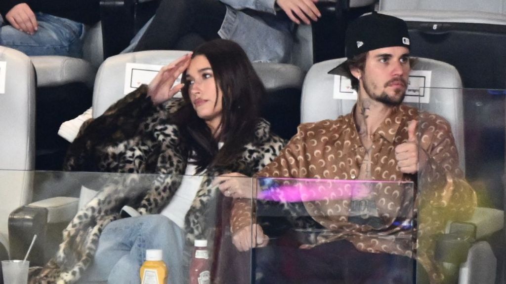 Canadian singer-songwriter Justin Bieber and his wife US model Hailey Bieber watch Super Bowl LVIII between the Kansas City Chiefs and the San Francisco 49ers at Allegiant Stadium in Las Vegas, Nevada, February 11, 2024.