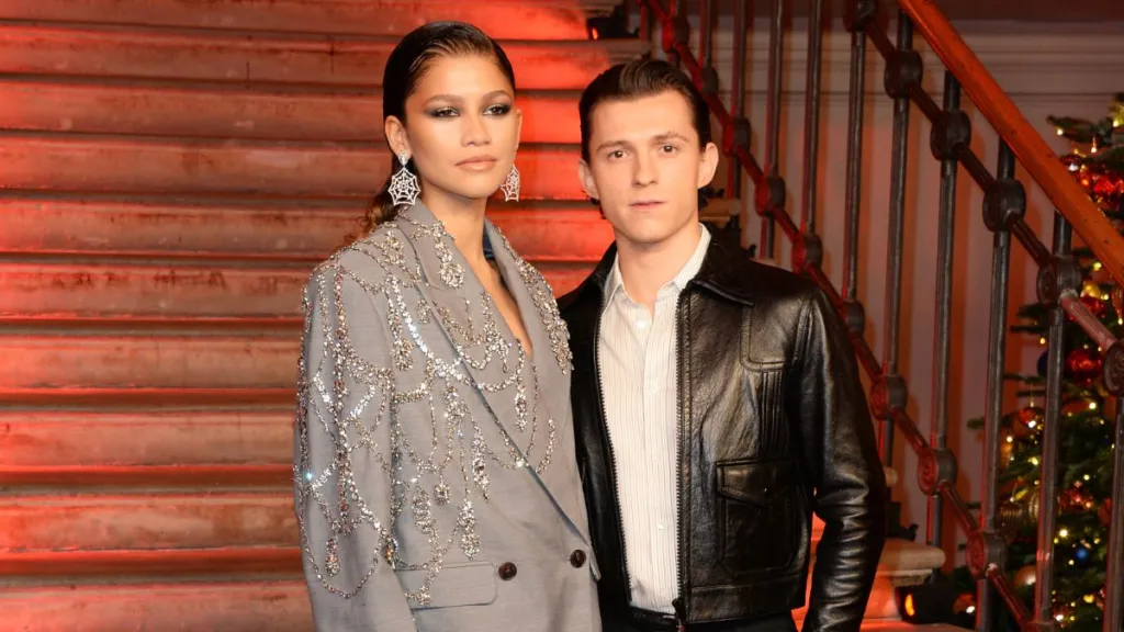 Zendaya and Tom Holland pose at a photocall for "Spider-Man: No Way Home" at The Old Sessions House on December 5, 2021 in London, England