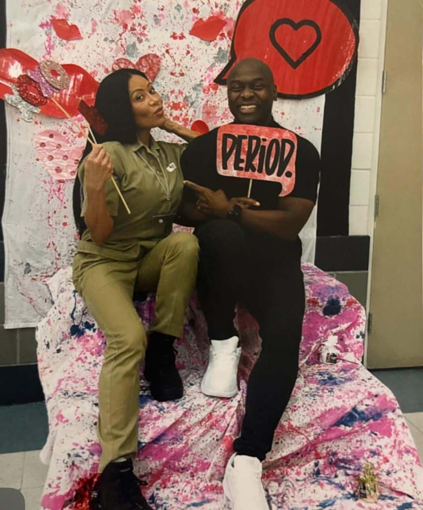 Jen Shah and Sharrieff Shah posing together with Jen in her prison jumpsuit