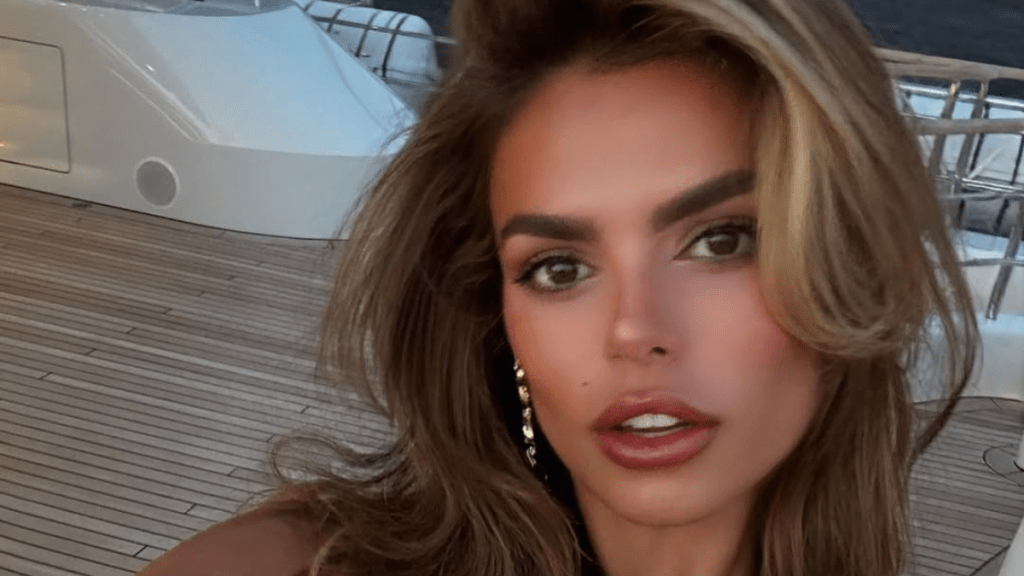 Brooks Nader plunging dress photos