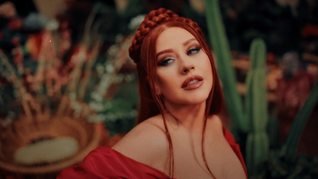 Christina Aguilera's Red Swimsuit Highlights Her Curves