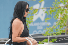 Kim Kardashian Goes Braless & Flaunts Her Curves in Gray Gown