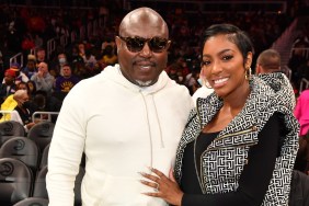 Porsha Williams and Simon Guobadia at a Atlanta Hawks game