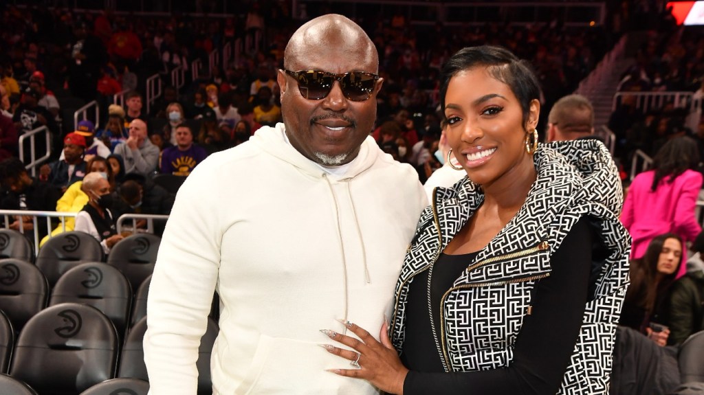 Porsha Williams and Simon Guobadia at a Atlanta Hawks game