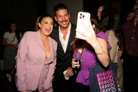 Brittany Cartwright and Jax Taylor taking a selfie with a fan at BravoCon