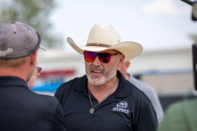 Steve McBee in red sunglasses and a cowboy hat
