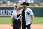 Steven McBee Jr and Calah Jackson posing together at a baseball game, wearing White Sox jerseys