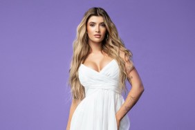 Sami Sheen in a white dress in front of a purple background