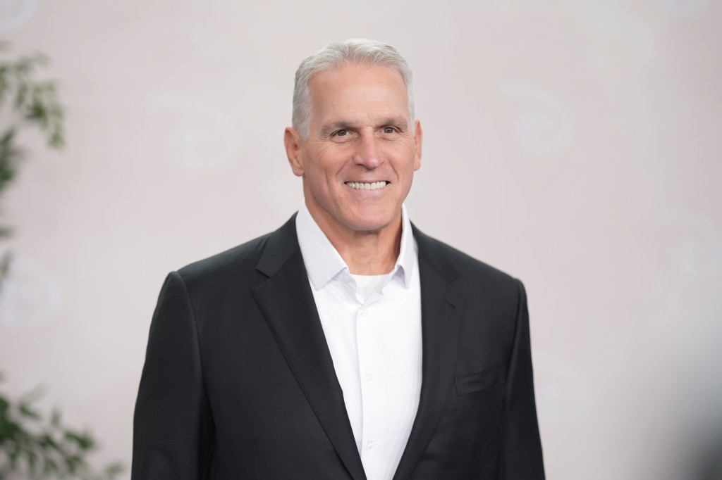 Mel Owens in a black suit at the 2025 Disney Upfront