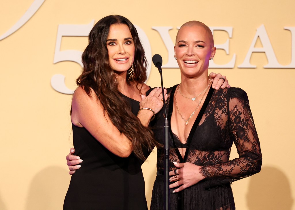 Teddi Mellencamp and Kyle Richards on stage at the Gracie Awards