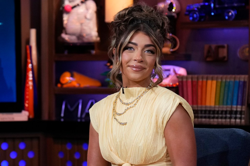 Gia Giudice in a yellow dress on Watch What Happens Live
