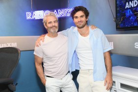 Andy Cohen and KJ Apa with their arms around each other in the SiriusXM Radio Andy studio