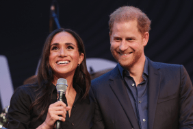 Prince Harry, Duke of Sussex and Meghan, Duchess of Sussex on stage