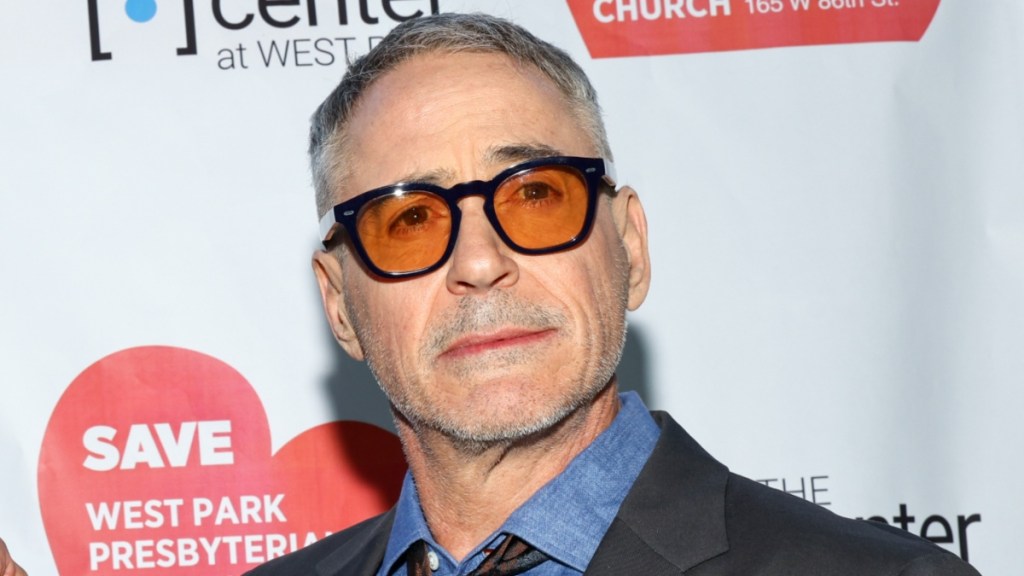 Robert Downey Jr. Pouts As He Shows Peace Sign in New Video