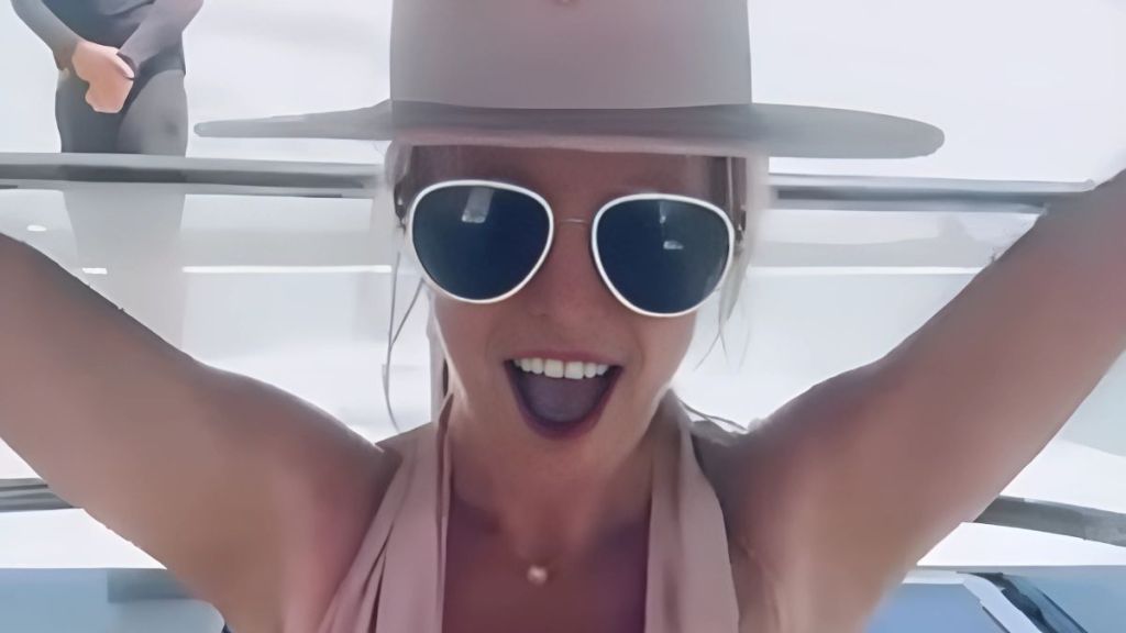 Britney Spears Wears Plunging Neckline Swim Suit in New Video