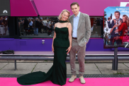 Pamela Anderson and Liam Neeson attend "The Naked Gun" German Premiere aboard "The Pioneer" at Anlegestelle John-Foster-Dulles-Allee on July 24, 2025, in Berlin, Germany.