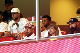 Travis Kelce #87 of the Kansas City Chiefs, Taylor Swift and Jason Kelce watch during the first half of the game between the Cincinnati Bearcats and the Nebraska Cornhuskers at Arrowhead Stadium on August 28, 2025 in Kansas City, Missouri.