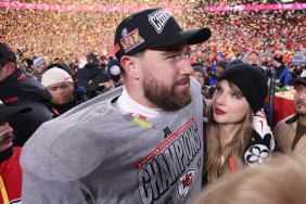 Taylor Swift celebrates with Travis Kelce #87 of the Kansas City Chiefs after defeating the Buffalo Bills 32-29 in the AFC Championship Game at GEHA Field at Arrowhead Stadium on January 26, 2025 in Kansas City, Missouri.