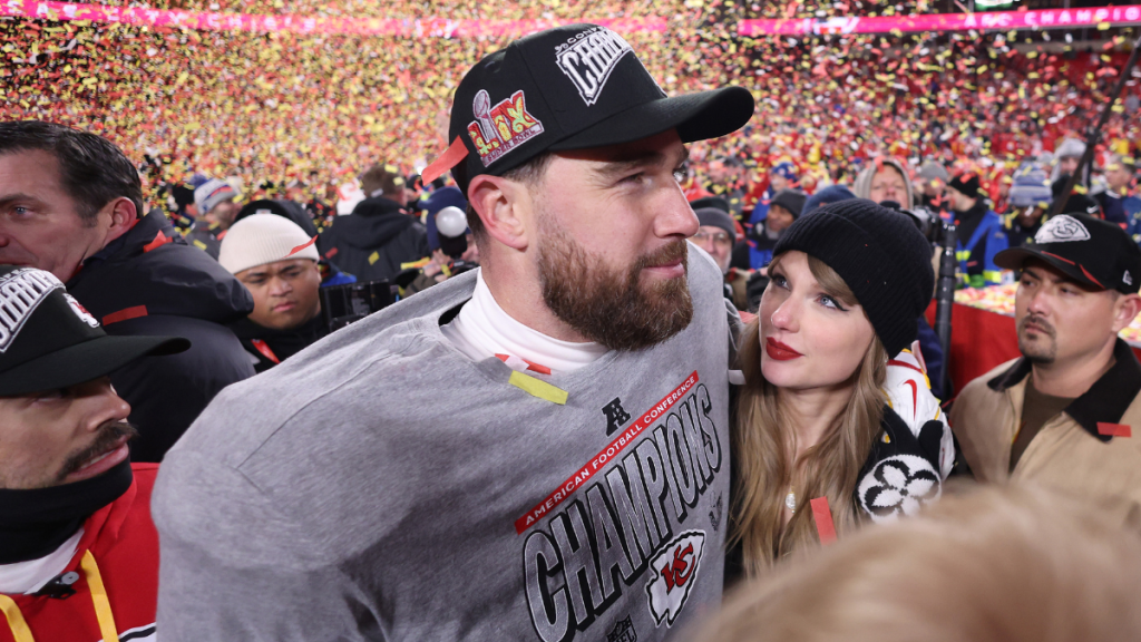 Taylor Swift celebrates with Travis Kelce #87 of the Kansas City Chiefs after defeating the Buffalo Bills 32-29 in the AFC Championship Game at GEHA Field at Arrowhead Stadium on January 26, 2025 in Kansas City, Missouri.