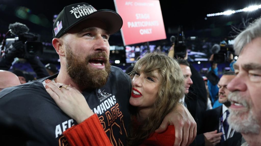 Travis Kelce #87 of the Kansas City Chiefs celebrates with Taylor Swift after a 17-10 victory against the Baltimore Ravens in the AFC Championship Game at M&T Bank Stadium on January 28, 2024 in Baltimore, Maryland